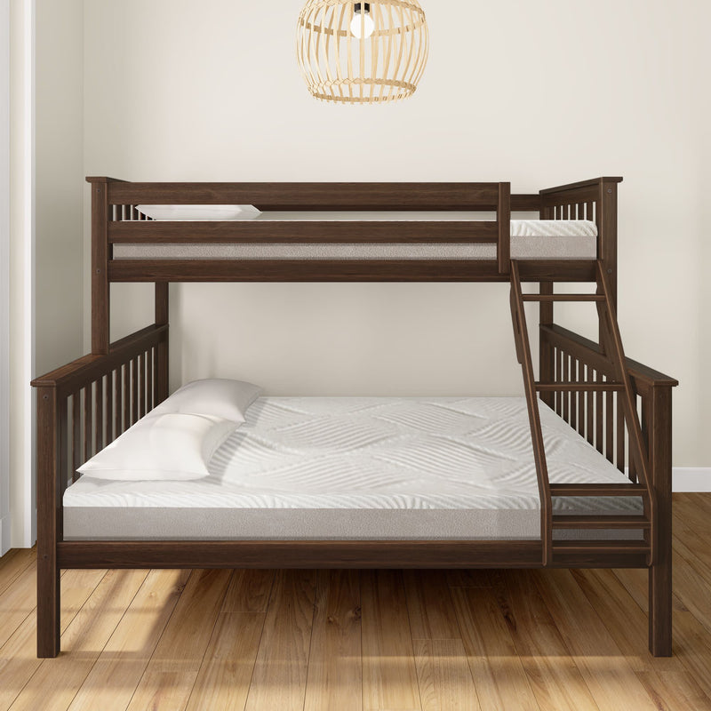 Dark wood twin over full bunk bed with ladder in a modern bedroom.