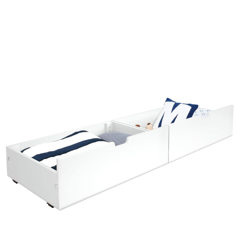 White wooden underbed trundle storage drawer with navy-striped bedding and blue letter pillow, low-profile roll-out organizer for kids' bedroom