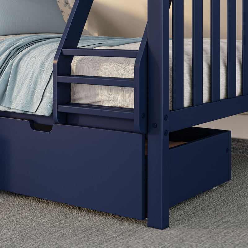 Close-up of navy blue wooden bunk bed ladder and built-in storage drawer with light blue bedding and gray mattress on a carpeted floor in a modern kids' bedroom