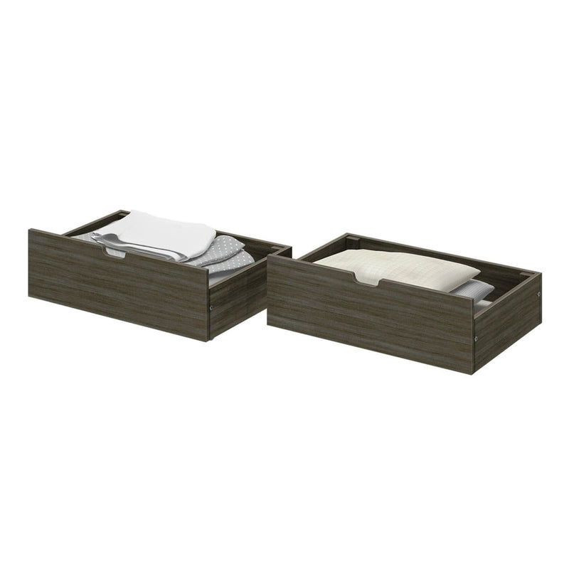 Pair of dark gray wood-grain under-bed storage drawers with cutout handles holding folded bedding and pillows for bedroom organization