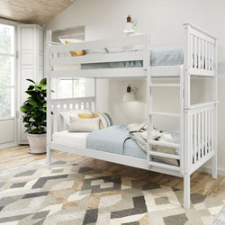 White wooden bunk bed with blue bedding in modern, cozy bedroom with natural light and geometric rug.