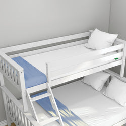 White wooden bunk bed with ladder and blue bedding in a modern bedroom setting.