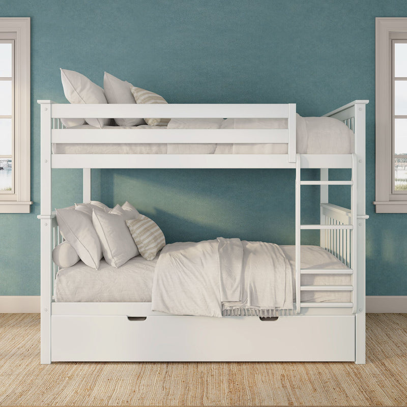 White wooden twin-over-twin bunk bed with ladder and under-bed storage drawer, beige linen bedding and pillows against a teal accent wall in a bright bedroom