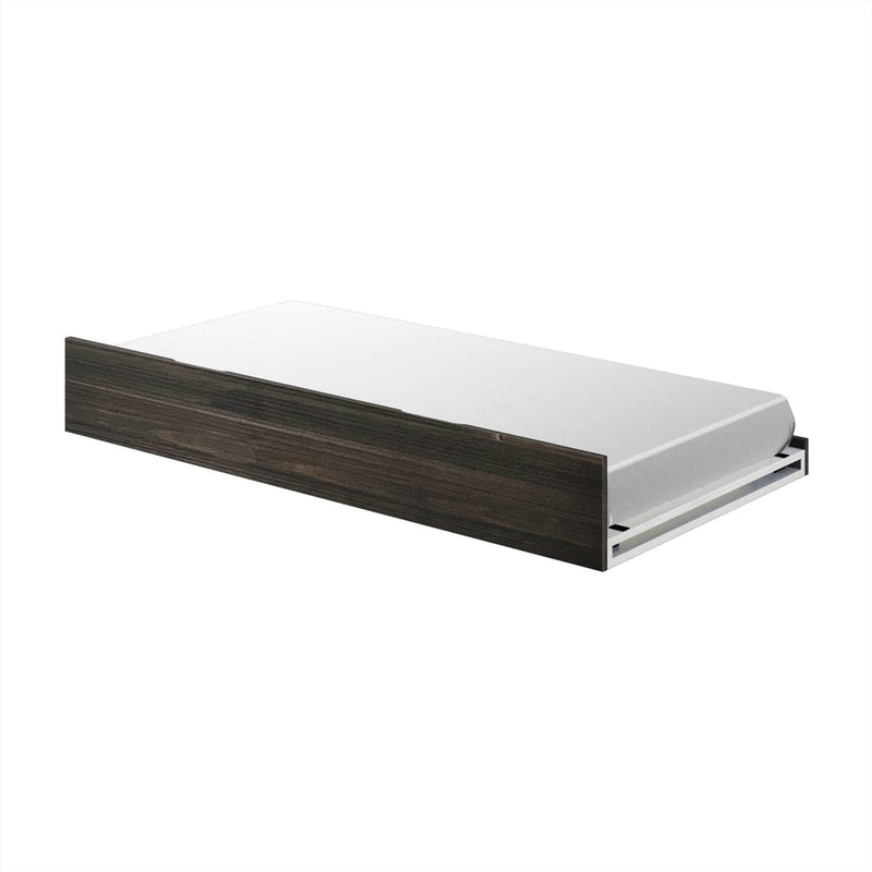 Space-saving dark wood trundle bed with white mattress and pull-out underbed platform for guest sleeping