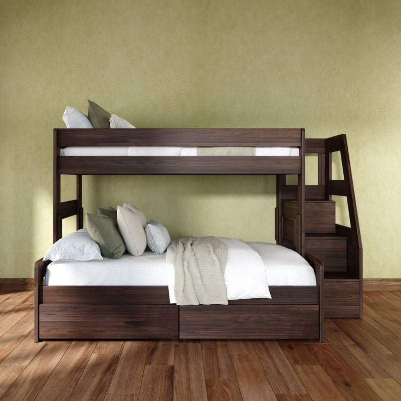 Dark wood bunk bed with built-in stairs and storage drawers, white bedding and green textured wall in a modern bedroom with hardwood floor