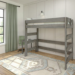 Loft bed with desk underneath in modern bedroom featuring light wood accents and a patterned rug.