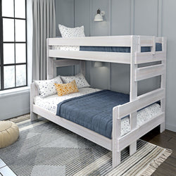 White wooden bunk bed with navy and white bedding in a modern bedroom.