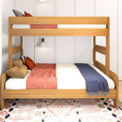 Wooden bunk bed with cozy bedding and decorative pillows in a modern bedroom.