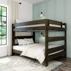 Rustic wooden bunk bed in stylish bedroom with natural light and decorative rug.