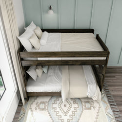 Rustic wooden bunk bed with white bedding in a cozy bedroom setting.