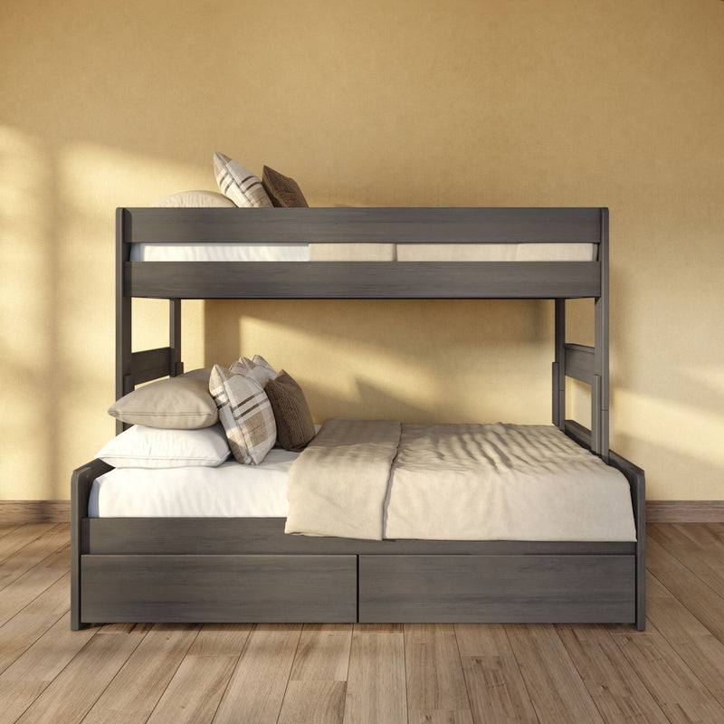 Gray wooden bunk bed with beige bedding and neutral patterned pillows in sunlit modern farmhouse bedroom with hardwood floor