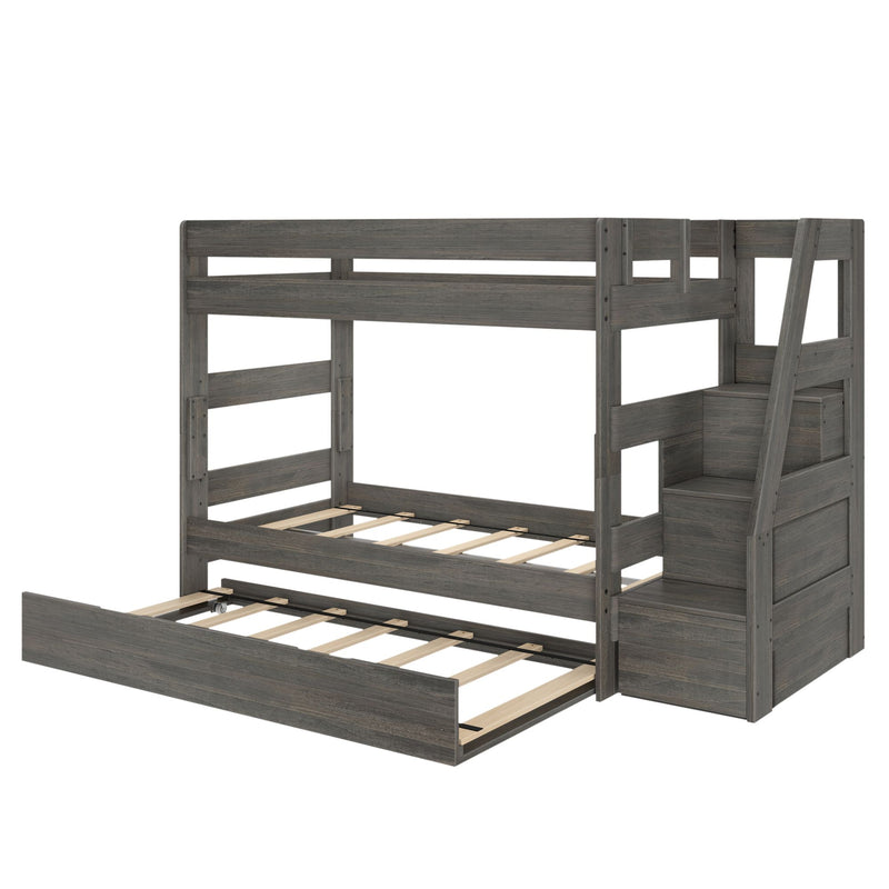 Gray wooden twin-over-full bunk bed with built-in staircase storage and pull-out trundle, modern rustic finish