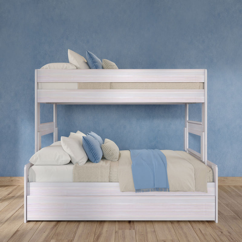 White wooden twin over full bunk bed with beige bedding, blue throw and striped blue and cream pillows against a textured blue wall on hardwood floor, modern kids’ bedroom