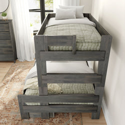 Gray wooden bunk bed in a modern bedroom with sunlight streaming through a window.