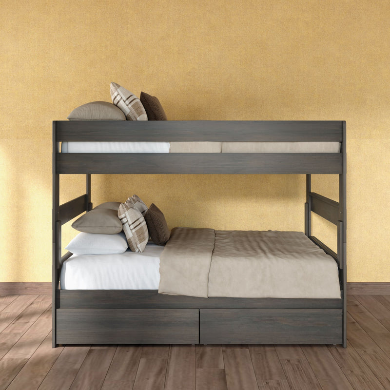 Modern dark gray wooden bunk bed with built-in storage drawers (twin-over-full), beige linens and plaid accent pillows on hardwood floor against a yellow wall