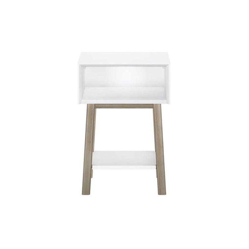Minimalist white wooden side table with open shelf and tapered legs for modern home décor.