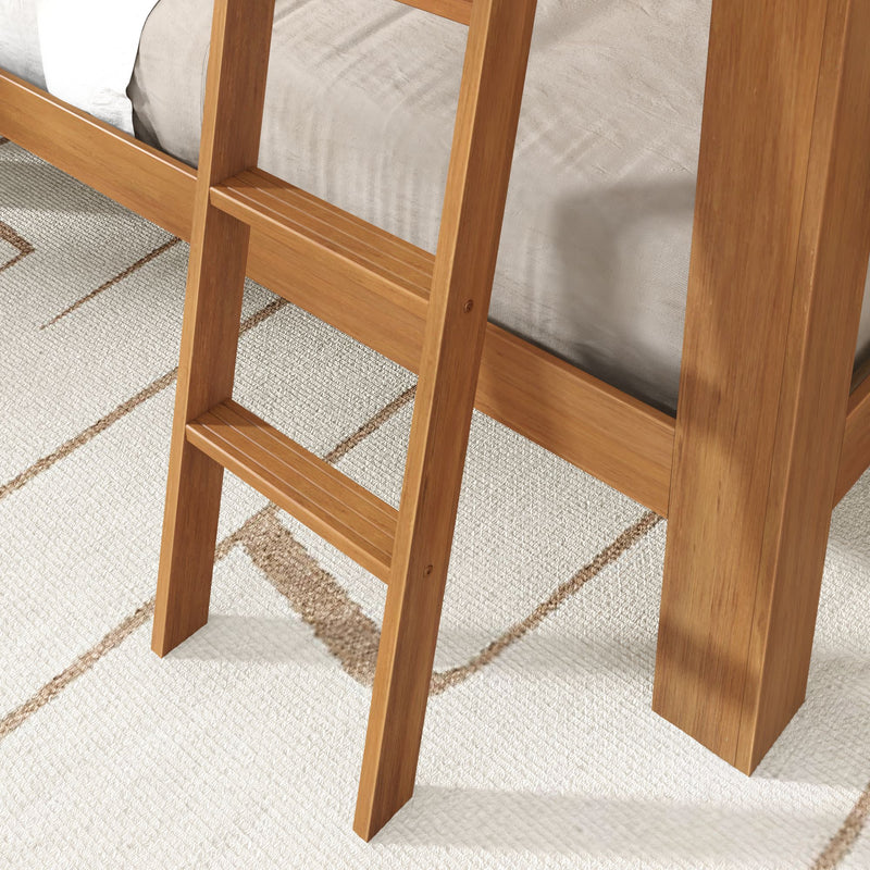 Close-up of a solid wooden bunk bed ladder and frame with natural finish on a textured area rug, sturdy two-step ladder for kids' bedroom furniture