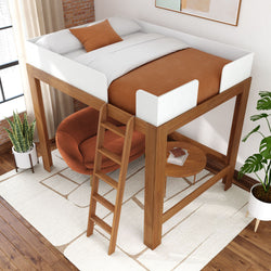 Modern loft bed with white and orange bedding, wooden frame, ladder, and cozy chair underneath in a stylish bedroom.