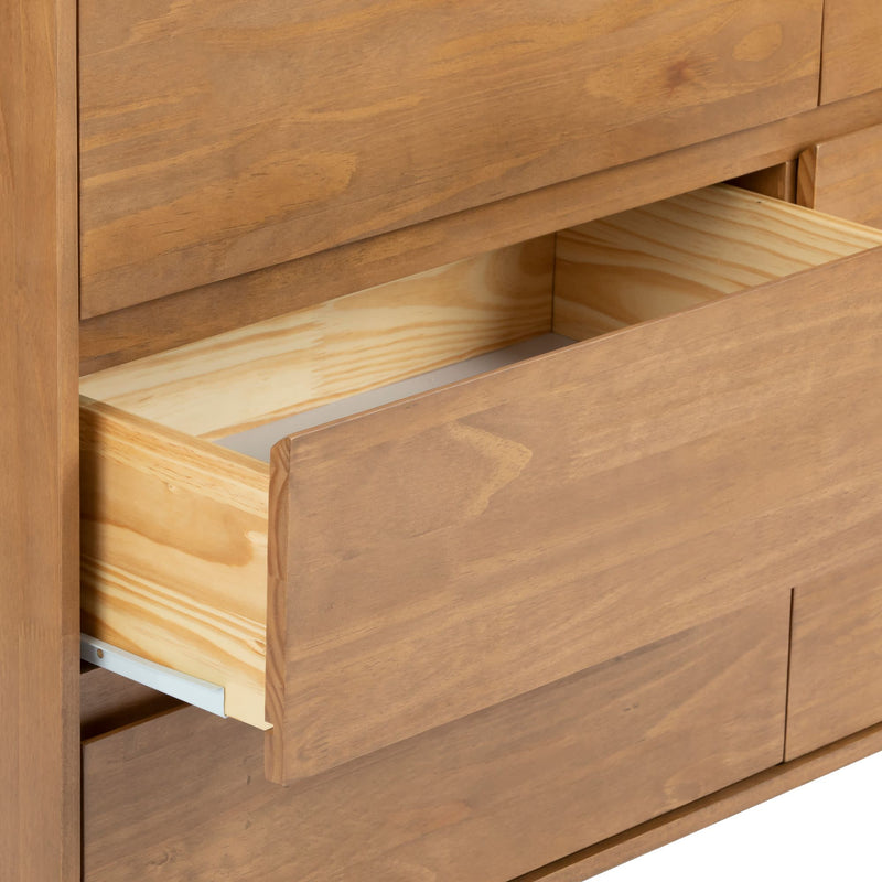 Open wooden dresser drawer with natural wood grain finish.