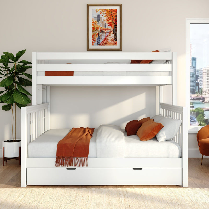 White loft bunk bed with pull-out storage drawer, orange throw and pillows, potted plant, framed art and city skyline view in a modern bedroom