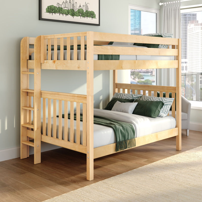 Solid light-wood twin-over-full bunk bed with green bedding and ladder in modern kids' bedroom by city-view window