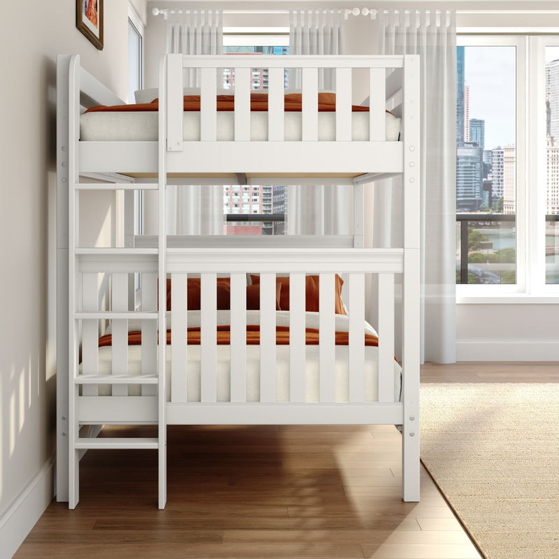 White wooden bunk bed with orange bedding and ladder in a bright modern kids' bedroom with sheer curtains, hardwood floor, and city skyline view