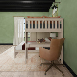 Loft bed with integrated desk and chair in a stylish green bedroom.