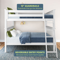 White bunk bed with 15-inch guardrails and reversible entry, featuring blue bedding and green pillows in a modern bedroom setting.