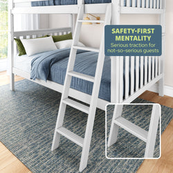 White bunk bed with safety ladder in a cozy bedroom setting, featuring blue bedding and a textured area rug.