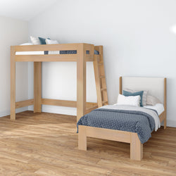 Modern minimalist bedroom with natural wood loft bed and matching single bed, blue patterned bedding, hardwood floors and white walls