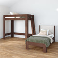 Modern wooden loft bed with ladder and matching twin bed, green quilt and decorative pillows in a minimalist bedroom with hardwood floors