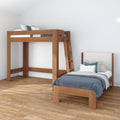 Modern minimalist children's bedroom with wooden loft bed and twin bed, ladder, blue bedding and hardwood floor