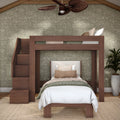 Wooden loft bunk bed with staircase and twin lower bed in a cozy bedroom with green floral wallpaper, neutral bedding, ceiling fan and potted plant