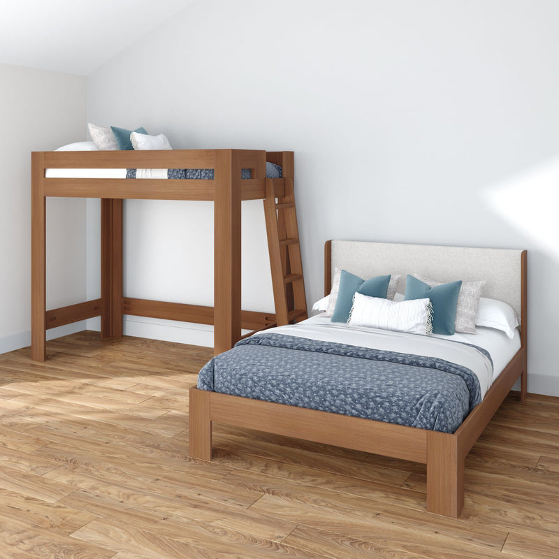 Modern minimalist bedroom with a wooden twin loft bed with ladder and matching wooden platform single bed frame, blue patterned bedding, decorative pillows, hardwood floor and white walls