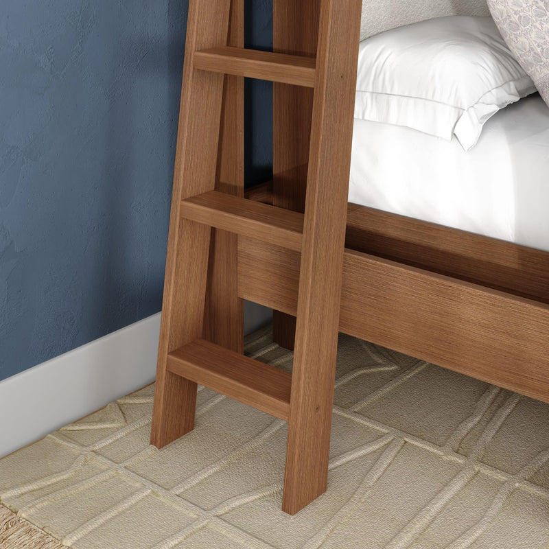 Wooden ladder attached to a bed frame beside white bedding, blue textured wall and beige patterned rug, ideal for bunk bed or loft bedroom décor