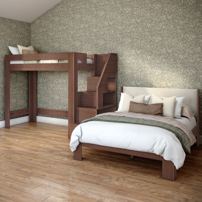 Modern bedroom with wooden loft bunk bed and staircase, full bed with neutral bedding, green floral wallpaper, hardwood floor