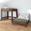 Dark walnut wooden loft bed with ladder and matching platform bed with green quilted bedding on hardwood floor in a minimalist modern bedroom