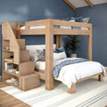 Solid light-wood loft bunk bed with built-in storage stairs, lower full bed dressed in blue floral and striped bedding, navy accent wall, area rug and potted plant