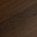 Close-up of dark brown stained wood grain texture on hardwood tabletop, natural wood pattern and warm matte finish
