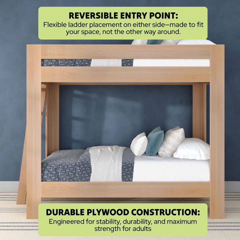 Modern natural wood bunk bed (twin over twin) with reversible ladder, durable plywood construction for adult strength, space-saving loft design styled with blue-gray bedding and pillows against a navy wall