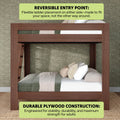Wooden bunk bed with reversible ladder and durable plywood construction, neutral bedding and floral wallpaper — space-saving, adult-strength loft bed.