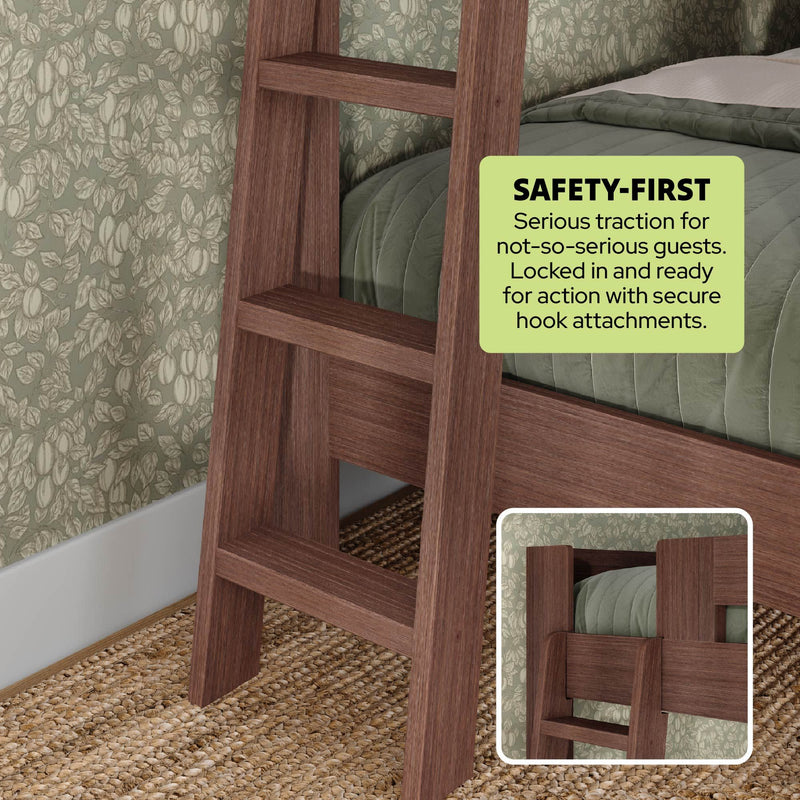 Wooden bunk bed ladder with secure hook attachments and non-slip traction, walnut finish beside green quilted bed, floral wallpaper and woven jute rug