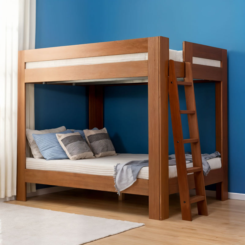 Solid wood bunk bed with ladder in a blue-accent bedroom, hardwood floors and neutral bedding — space-saving kids' room furniture.