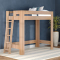 Natural solid wood loft bed with ladder and twin mattress, open under-bed space in modern navy-blue bedroom