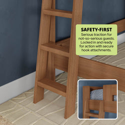 Close-up of a warm wood-finish bunk bed ladder with wide anti-slip rungs and secure hook attachments for safety, shown leaning against a blue wall on a textured rug.