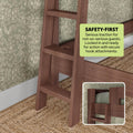 Solid wood bunk bed ladder with secure hook attachments and traction steps next to green floral wallpaper and woven jute rug