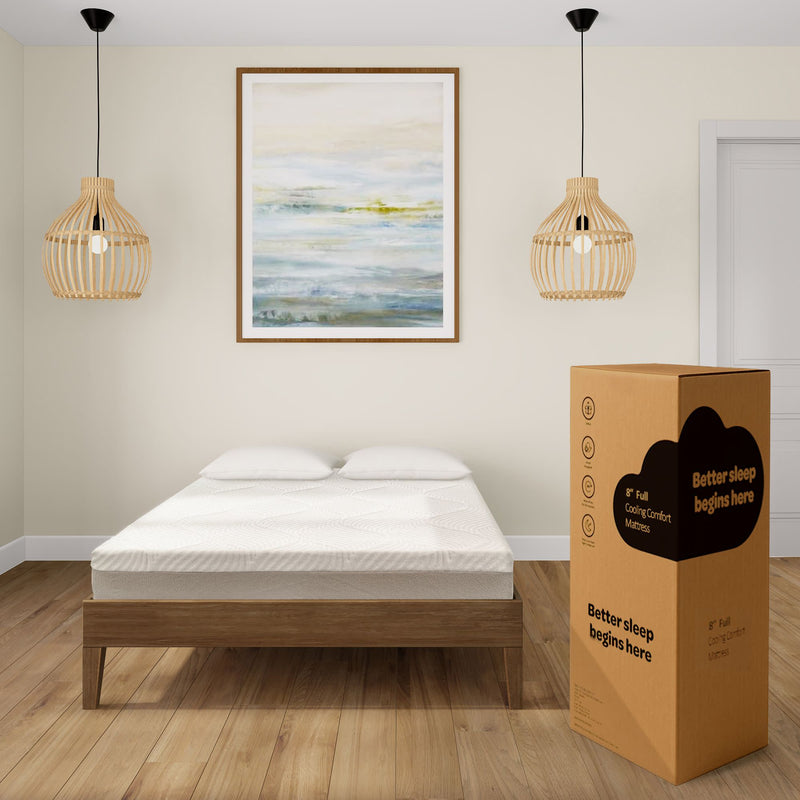 Modern bedroom with a plush mattress and elegant wooden frame, featuring a box labeled 'Better sleep begins here' for ultimate comfort and style.