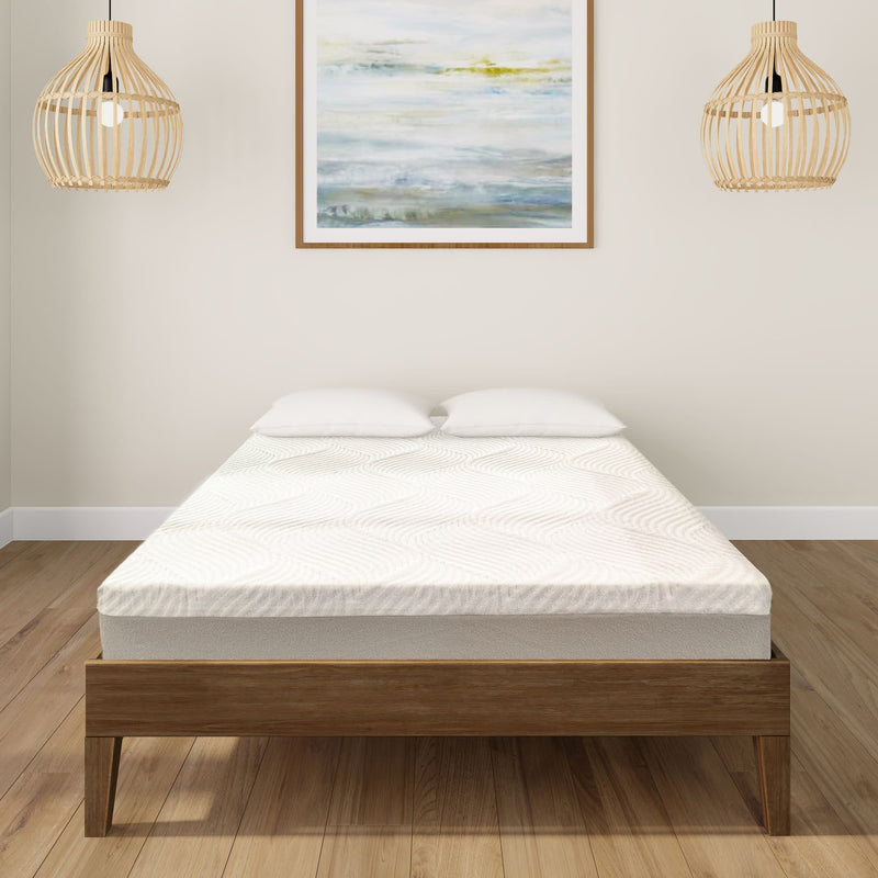 Modern bedroom with minimalist wooden bed frame and plush mattress surrounded by cozy decor and bamboo lighting fixtures.