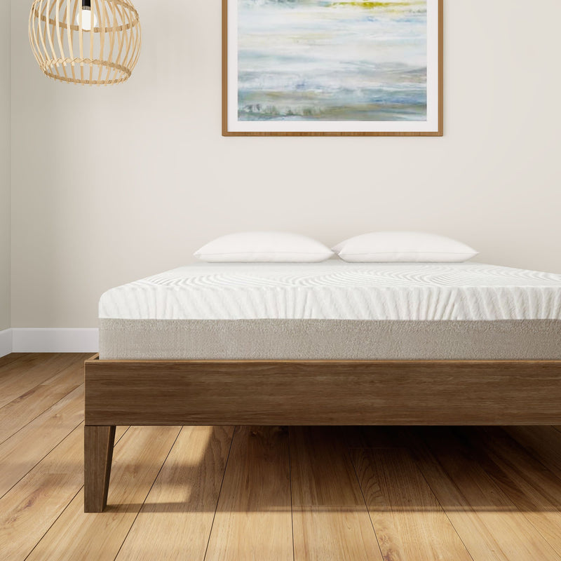 Luxury memory foam mattress on modern wooden bed frame in a minimalist bedroom.
