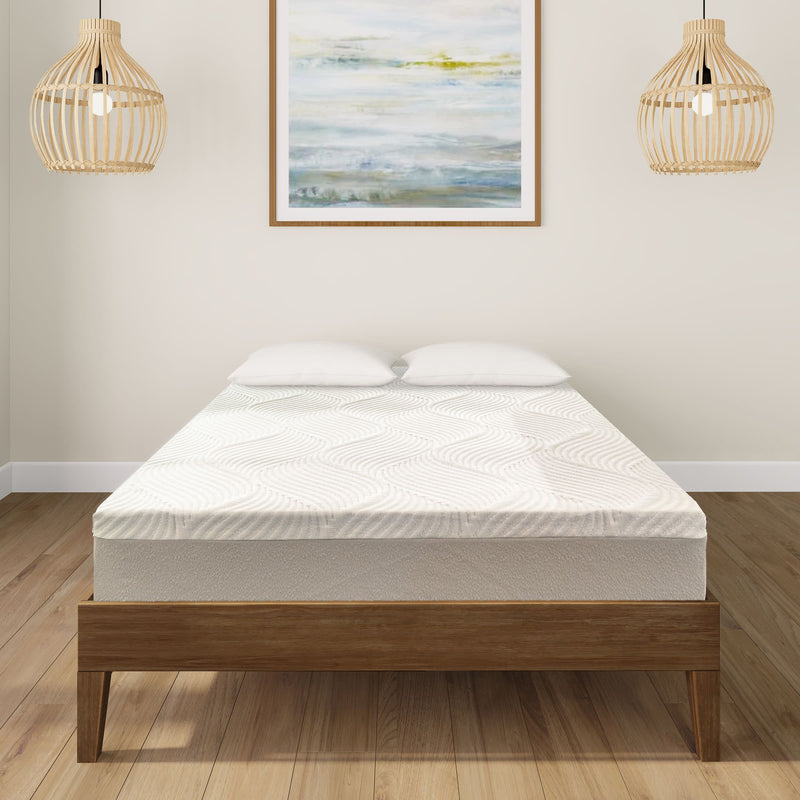 Modern bedroom with a comfortable mattress on a wooden bed frame and elegant pendant lights.
